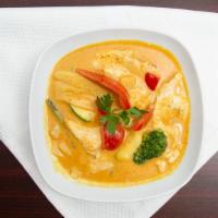 Red Curry Chicken Dinner · Served with an egg roll.