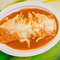 Chimichanga Real · 10-inch flour tortilla with choice of steak or chicken cooked with bell peppers, onions, tom...