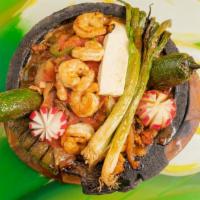 Molcajete El Gallo · Marinated chicken, steak, shrimp, and chorizo with sauteed onions. bell peppers, tomatoes, a...