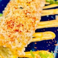 Elote On The Cobb · cotija cheese + cilantro + scallion + spicy aioli
