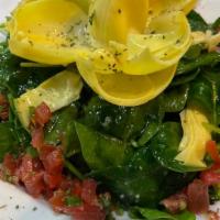 Spinach & Artichoke Salad · Spinach, artichoke, tomatoes, red onions & lemon dressing