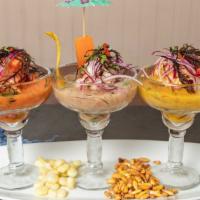 Triología De Ceviche · Ceviche marinated in three kinds of Peruvian chili peppers with red onions, sweet potatoes a...