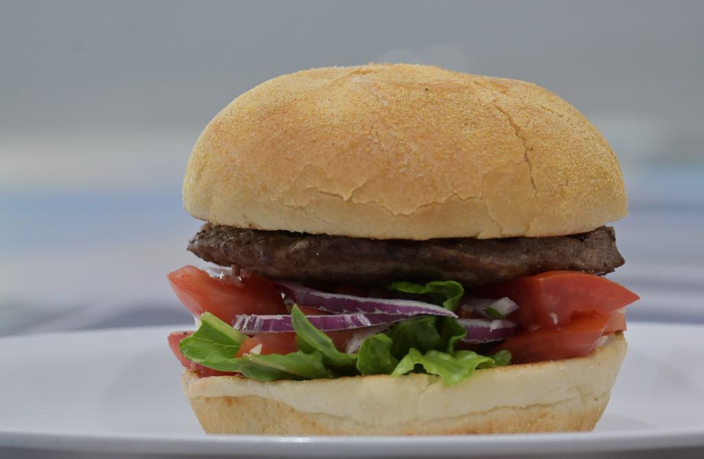 Burger · Quarter Pound of flame-grilled beef with lettuce, tomato, mayo, and onions.