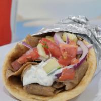Gyro Pita · Specially seasoned beef and lamb meat topped with tzatziki, tomatoes, onions, and cucumbers.