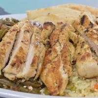 Chicken Platter · Specially marinated Char-Grilled Chicken Breast. Served with two sides, and Pita Bread and T...