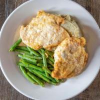 Pub Chicken · Fresh chicken breasts seasoned and pan fried served with mashed potatoes, green beans and dr...