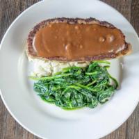Keegans Meatloaf · Homemade with beef, pork, and veal served over mashed potatoes, covered with rich brown grav...