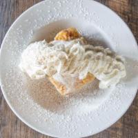 Krispy Kreme Bread Pudding · With vanilla bean ice cream.