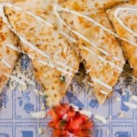 Quesadilla  · Large flour tortilla, mexican cheese blend and pico de gallo. Protein of choice.