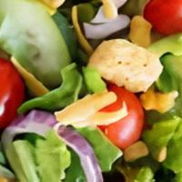 House Salad · Mixed greens, tomatoes, cucumbers, carrots, and balsamic vinaigrette