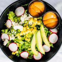 Mango Avocado Salad · field greens, avocado, mango, radish, goat cheese, chipotle dressing