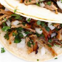 Carnitas · (Slow Cooked Pork)
SERVED WITH CILANTRO AND ONION