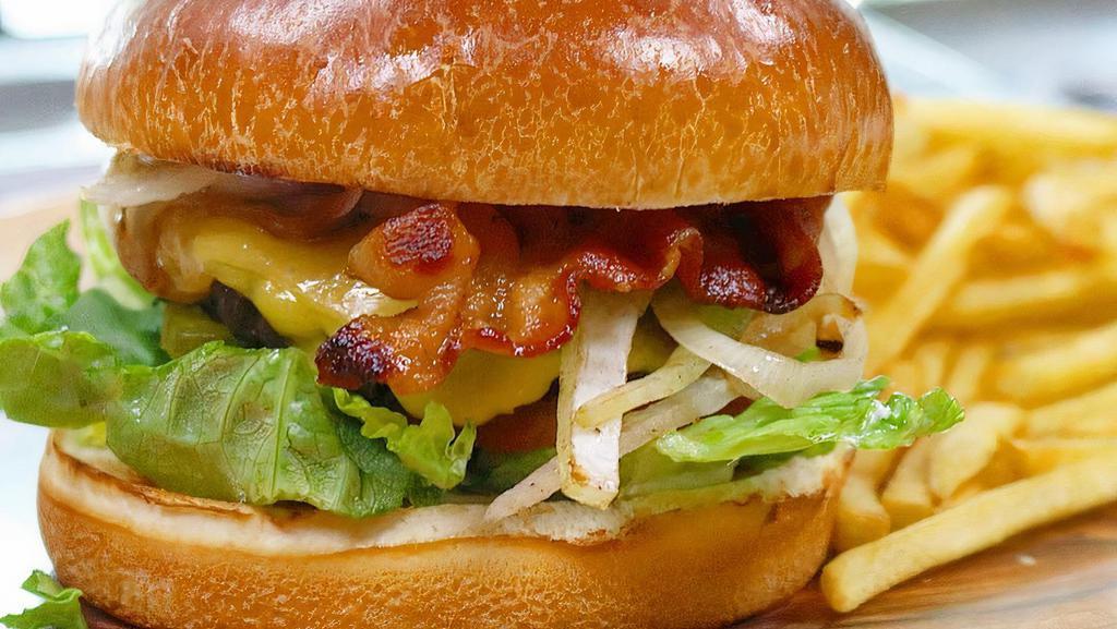 The Classic · Beef patty topped with bacon, American cheese, lettuce, tomato, pickles, onion, mayo, ketchup.
