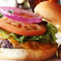 Pub Classic Burger · Eight ounces beef, lettuce, tomato, onion, brioche bun.