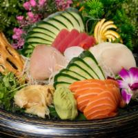 Sashimi Mori · Special chef's selection of 15 pieces of fish and seafood. Served with miso soup or green sa...