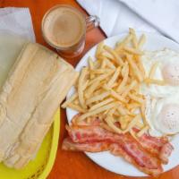 2 Egg Breakfast With Fries · Fried or scrambled, with Ham or sausage, fries, café con leche or soda.