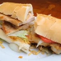 Chicken Sandwich · Lettuce, tomato, onion, potato sticks and mayonnaise on pressed Cuban bread.