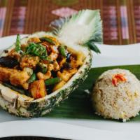 Kai Siam · Sautéed crispy chicken breast with sweet red chili paste, fresh pineapples, onions, scallion...