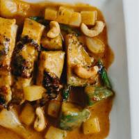 Kai Yang Massaman · Grilled lemongrass chicken breast in massaman curry with avocado, green beans, cashew nuts, ...
