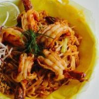 Panang Talay · Pan seared jumbo prawns, calamari and sea scallops in panang curry, jasmine rice
