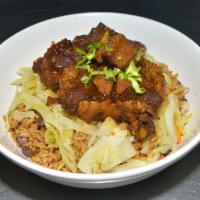 Oxtail · Served with one side and rice and peas or white rice.