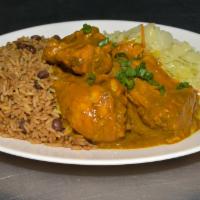Curry Chicken · Served with one side and rice and peas or white rice.