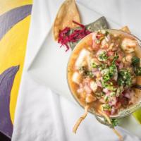 Ceviche Del Mar · Ocean freshest, mango, avocado, red onion, chiles in a citrus marinade.