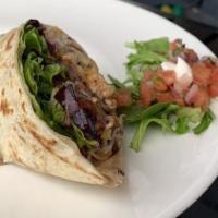 Burritos · Wrapped with a flour tortilla, made with mixed greens, black beans, rice, corn, cheese, pico...