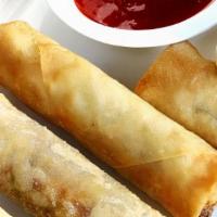 Spring Rolls  · crispy fried spring roll sweet chili sauce on the side.