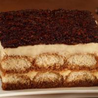 Tiramisu  · Wiped mascarpone cheese, lady fingers dipped in coffee and cacao powder served with whip cre...