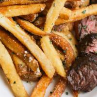 Steak Frites · parmesan-herb fries, truffle hollandaise sauce
