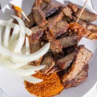 Suya · Thinly sliced grilled beef