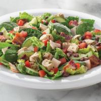 Mediterranean Salad · Romaine, spinach, chicken, turkey, nitrate-free bacon, grape tomatoes, cucumber and kalamata...
