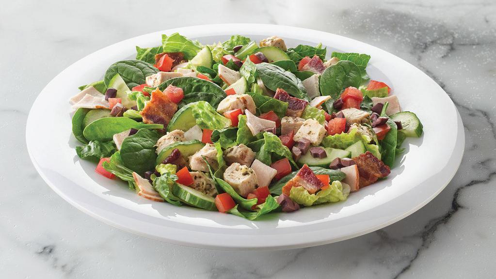 Mediterranean Salad · Romaine, spinach, chicken, turkey, nitrate-free bacon, grape tomatoes, cucumber and kalamata olives. Served with house-made balsamic dressing on the side. (175 cal), 21g protein, 5 g carb, 4 g fat, 2 g fiber.