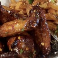 20 Wings · offered as Hot. Medium. Mild flavors
