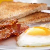 The Traditional · Gluten-free. Two eggs any style with your choice of Applewood-smoked bacon, pork sausage, Ca...