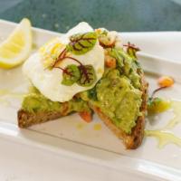 Avocado Multi Grain · Thick-cut multi grain toast topped with egg and hand-crushed avocado, maldon sea salt, EVOO,...