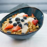 Rise & Shine Granola Bowl · Layered-to-order with non-fat Greek yogurt, seasonal berry blend, housemade cardamon tahini ...