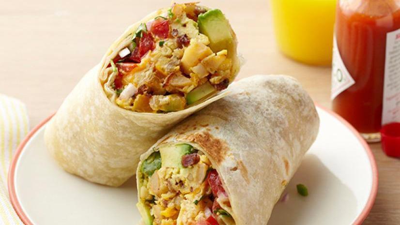 The Spanish Wrap · Spicy.  A classic!  Packed with scrambled eggs, Spanish chorizo, jalapeños, Hass avocado and pepper-jack cheese.  Served with crispy, shredded hash browns.