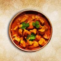 Chicken Tikka Feast · Char grilled chicken morsels slow cooked in a rich onion and tomato gravy with generous amou...