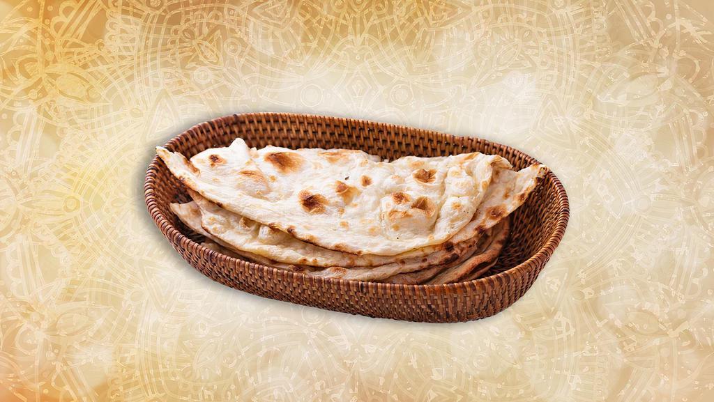 Naan  · House made pulled and leavened dough baked to perfection in an indian clay oven
