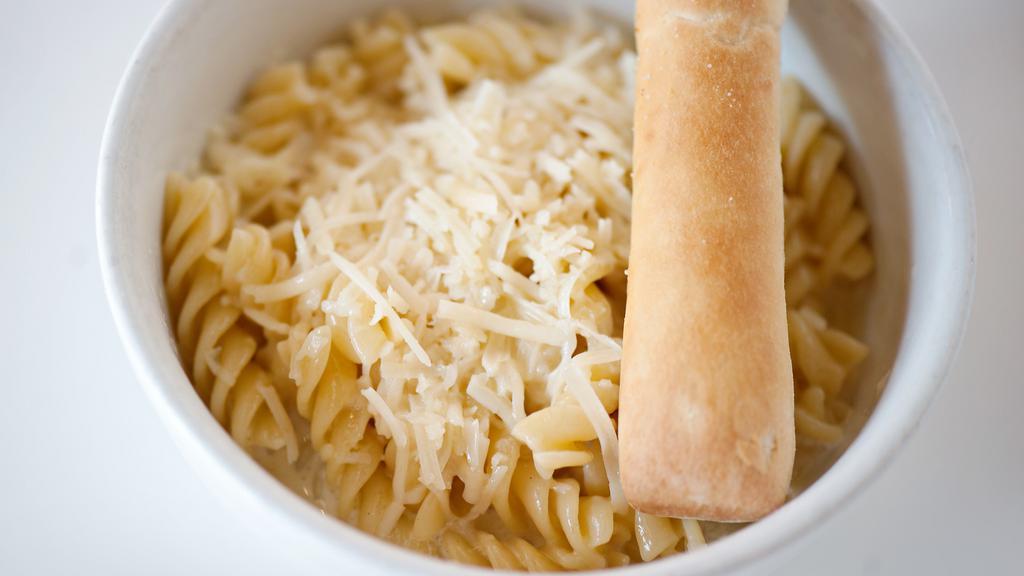 Kids Alfredo · Curly pasta tossed with a freshly made cream sauce and topped with Parmesan and Romano cheeses.
