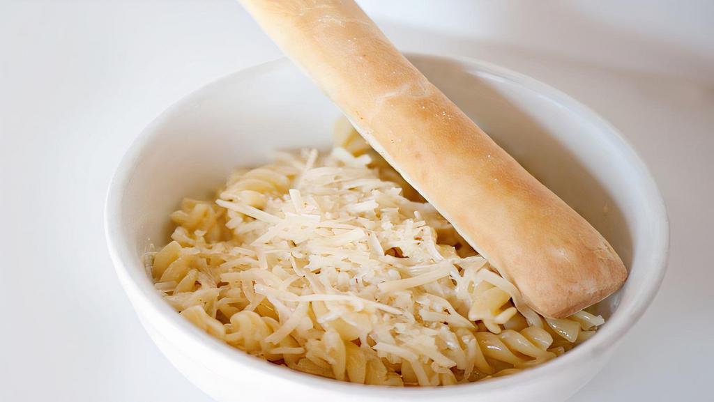 Kids Buttery Noodles · Curly pasta with a touch of butter and cream, topped with freshly grated Parmesan and Romano cheeses.