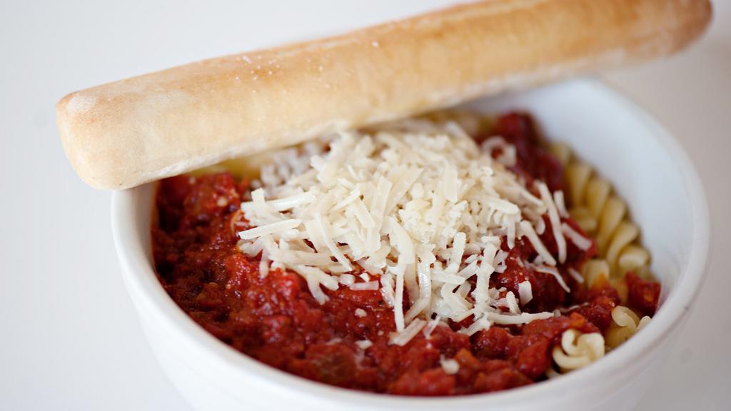 Kids Spaghetti · Curly pasta topped with marinara sauce and grated Parmesan cheese.