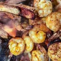 Chicken & Steak Fajitas · Grilled onions, peppers and tomatoes, lettuce, sour cream, guacamole, pico de gallo, rice, c...