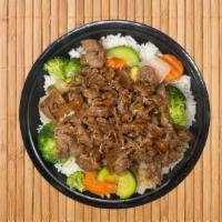 Beef · Comes with sautéed vegetables: onions, broccoli, carrots, zucchini and steamed rice. Topped ...