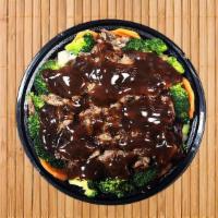 Beef · Comes with extra sautéed vegetables: onions, broccoli, carrots, zucchini. No rice. Topped wi...