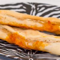 Pizza Stick · Tomato sauce, pepperoni and cheese filled dough stick.