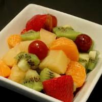 Fresh Fruit Salad · Seasonal fresh fruits (mix of grapes, berries, strawberries, pineapple).