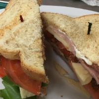 Club Sandwich · Ham, turkey, bacon, swiss cheese, mayo, mustard.